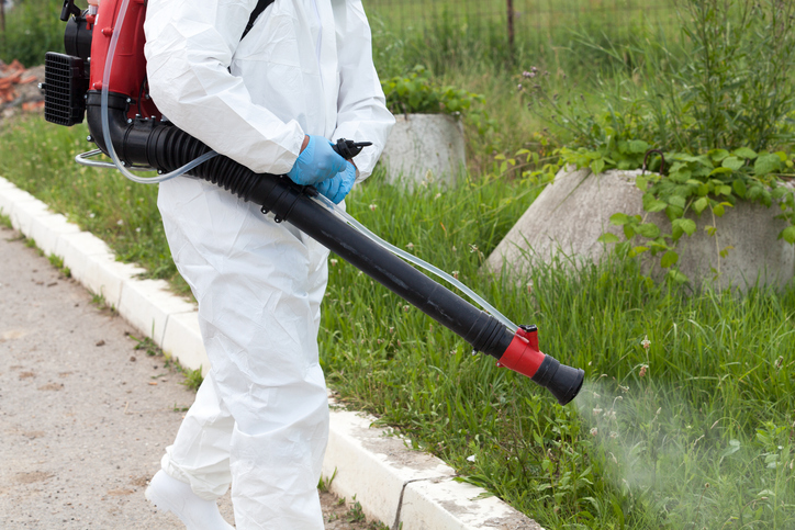 Tick Extermination in Nacogdoches, TX 1 Pest control worker spraying insecticide